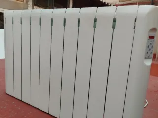 Radiadores eléctricos calor azul pared. Haverland