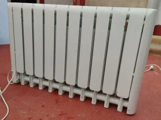 Radiadores eléctricos calor azul pared. Haverland