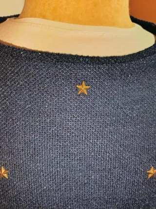 Jersey azul con estrellas doradas