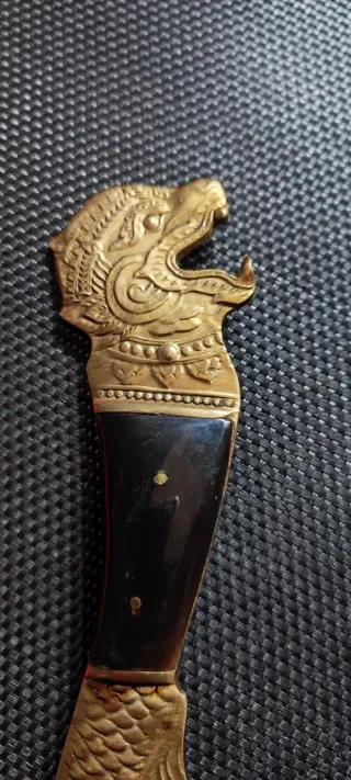 Antico cavatappi con design drago