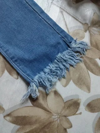 Jeans bimba con frange