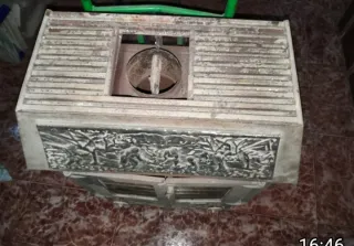 VENDO ESTUFA DE LEÑA DE HIERRO COLADO.