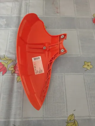 Protector cabezal desbrozadora Stihl naranja