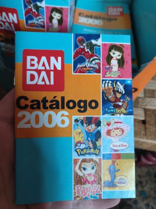 CAJA EXPOSITORA 50 CATALOGOS POKEMON DRAGON BALL..