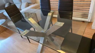 Mesa de comedor de cristal y 6 sillas