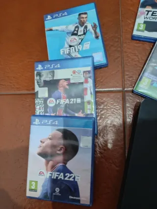 Consola PS4 Slim 500 GB + 7 juegos + mando