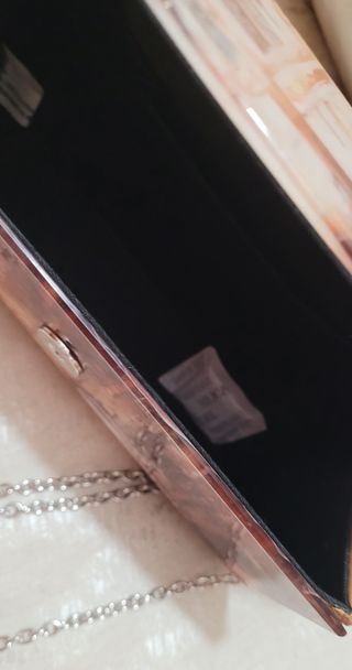 Bolso de mano estampado con cadena