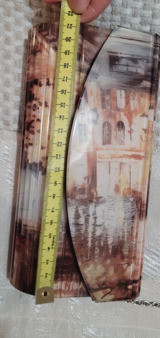 Bolso de mano estampado con cadena