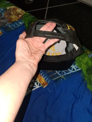 Tris berretti DEKRA neri