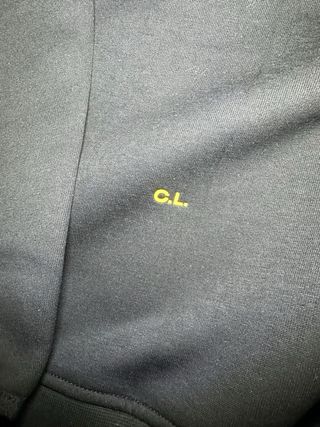 Conjunto Nike NOCTA Negro y Dorado