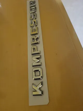 Logo posteriore e laterale kompressor