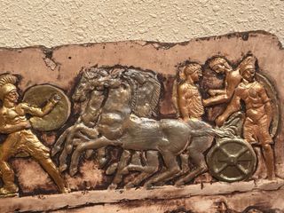 Placa de relieve antigua batalla barro