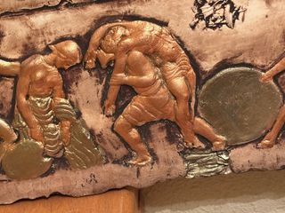 Placa de relieve antigua batalla barro