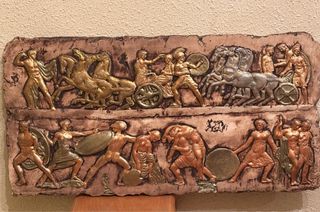 Placa de relieve antigua batalla barro