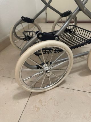 Carrito de bebé de juguete azul marino