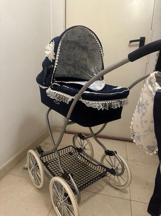 Carrito de bebé de juguete azul marino