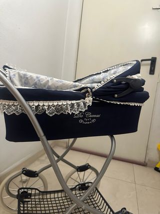 Carrito de bebé de juguete azul marino