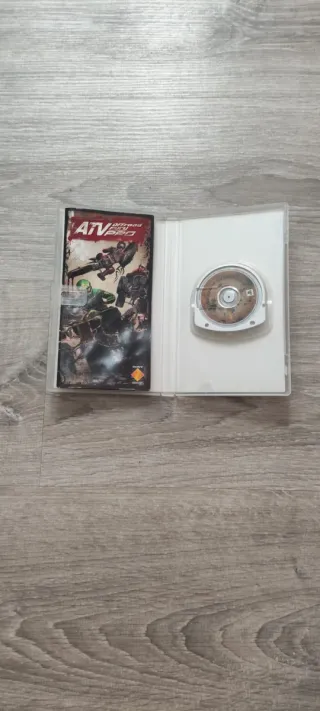 Pacchetto PSP 1000 Fat Nero + 5 Giochi