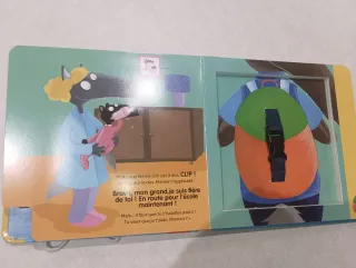 P'tit Loup apprend à s'habiller Livre avec bout...