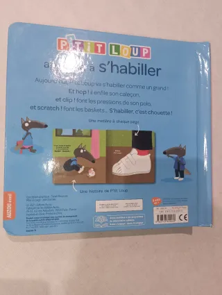 P'tit Loup apprend à s'habiller Livre avec bout...