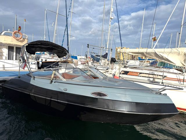 Lancha Hunton XRS 43 restaurada y con remolque.