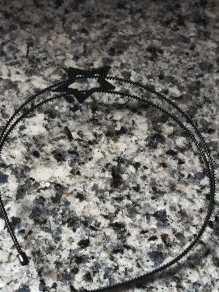 Diadema con estrella plateada