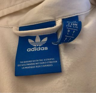 Chaqueta Adidas con rayas rojas