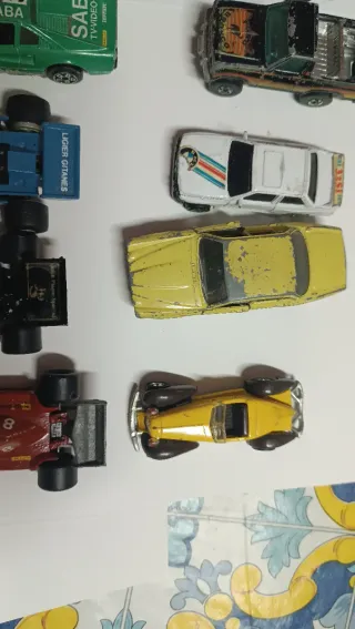 Lotto 12 modellini auto d'epoca e da corsa