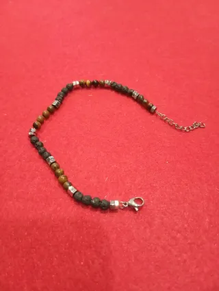 Bracciale con pietre laviche e occhio di tigre
