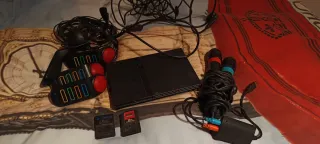 PS2 Slim Negra + Caja + juegos y accesorios