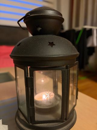 Portavelas de metal y cristal negro