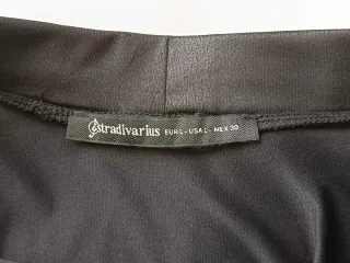 Falda negra efecto piel talla L