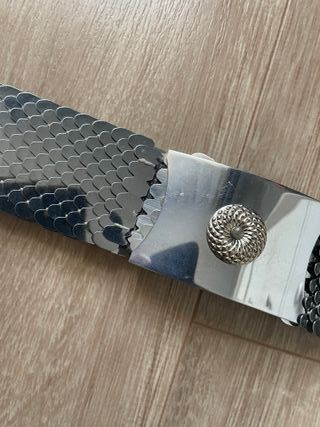 Cinturón plateado