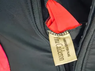 Traje de baño Yina Calderón negro/naranja