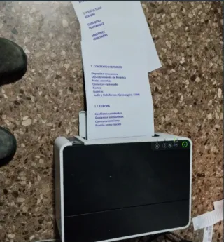 Impresora Epson ET-M1120 con bote de tinta y hojas