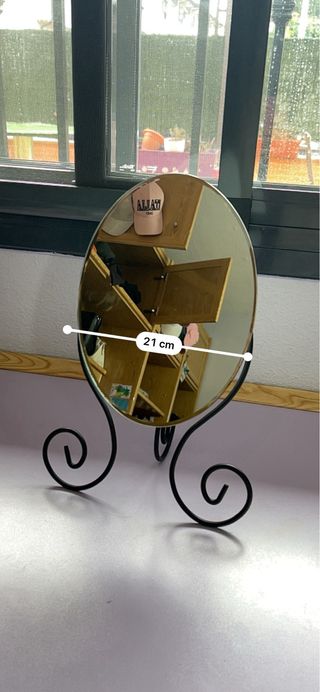 Espejo de mesa ovalado con base decorativa