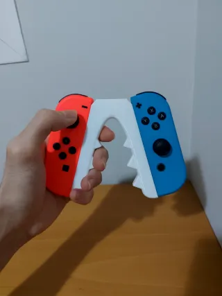 Soporte mandos y juegos Nintendo Switch