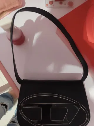 Bolso Diesel Negro y Dorado