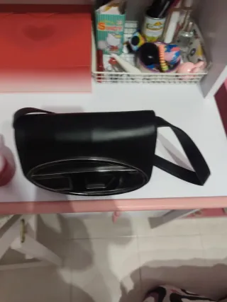 Bolso Diesel Negro y Dorado