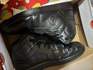 Jordan 1 Mid Negras