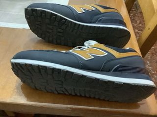 Deportivas New Balance Azul y Dorado