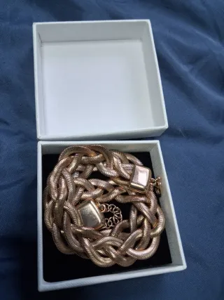 Collar trenzado dorado y plateado