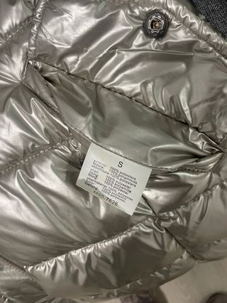 Plumífero reversible plateado