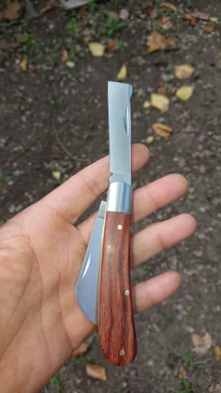 Cuchillo plegable Doble Hoja