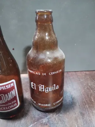 Bottiglie di Birra Vintage Damm e El Águila