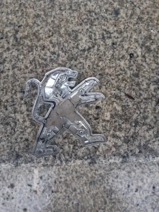 Símbolo Peugeot Leão Cromado