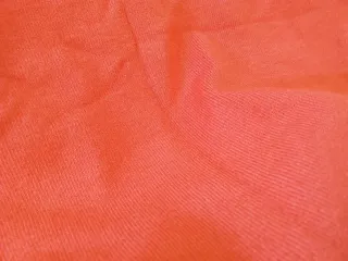Top naranja cuello alto sin mangas