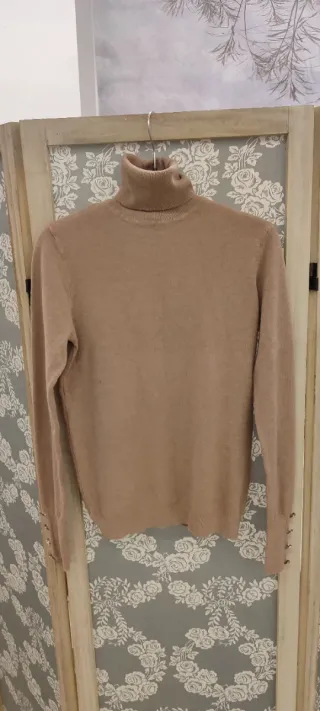 Jersey chica cuello alto beige manga larga