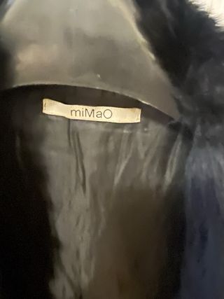 Chaleco de pelo negro