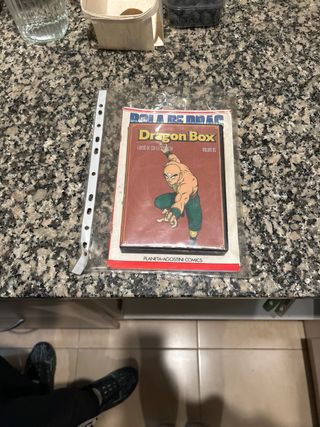 Lote de 2 comics de bola de drac y 2 DVD.
